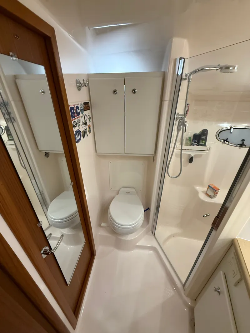 Slide: The Image of Tiara Yachts 42 Open 2004 bathroom with shower and toilet. - 33