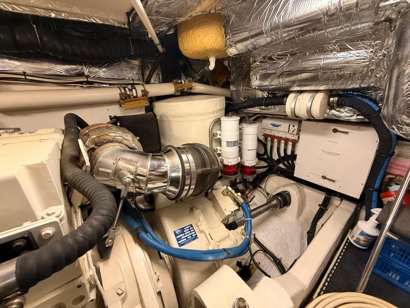 Slide: The Image of Engine room of 2004 Tiara Yachts 42 Open with technical details. - 47