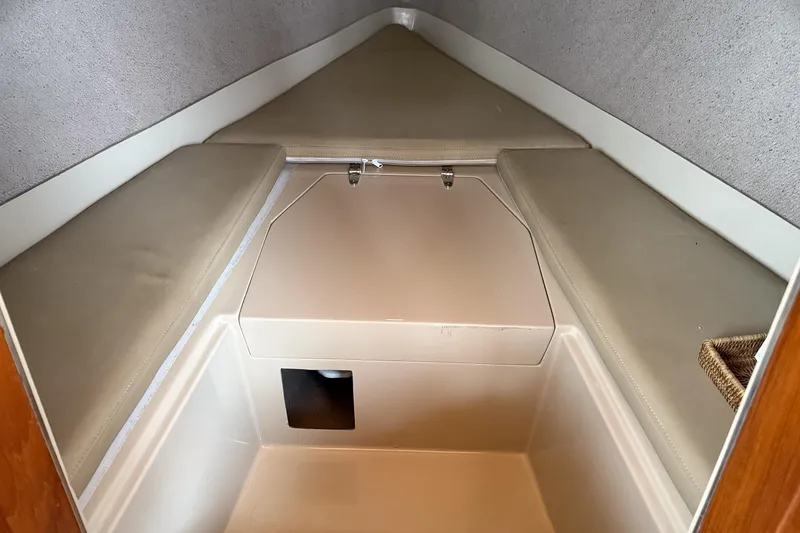 Slide: The Image of 2007 Duffield Cutty Cabin interior with beige cushions and storage compartment. - 3