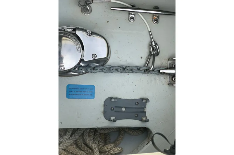 Slide: The Image of 2019 Chris-Craft Catalina 27 boat deck with anchor chain and winch. - 20