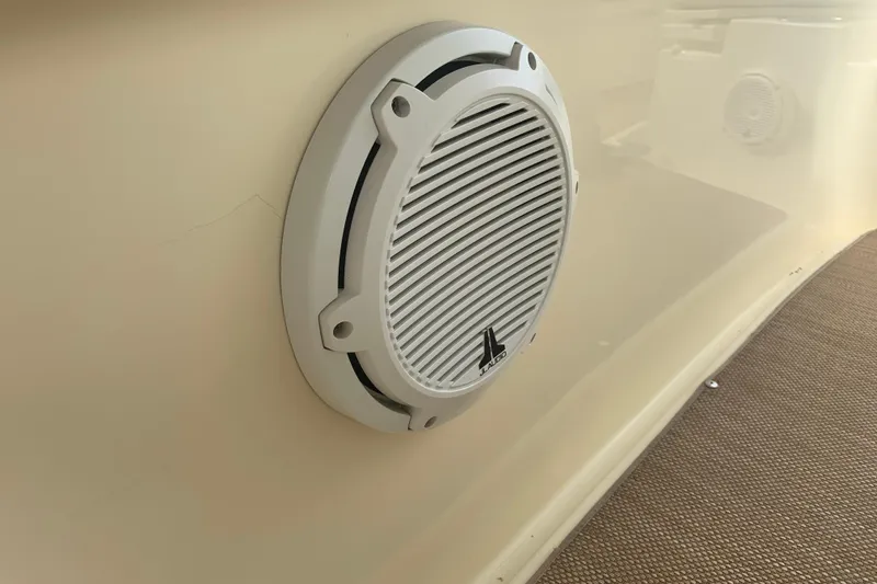 Slide: The Image of 2019 Chris-Craft Catalina 27 boat speaker on beige interior panel. - 35