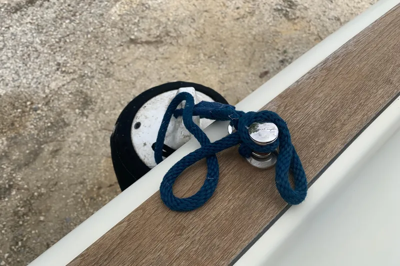 Slide: The Image of Blue rope tied on 2019 Chris-Craft Catalina 27 boat cleat. - 36