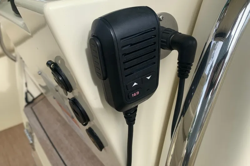 Slide: The Image of Close-up of a 2019 Chris-Craft Catalina 27 boat's communication device. - 50