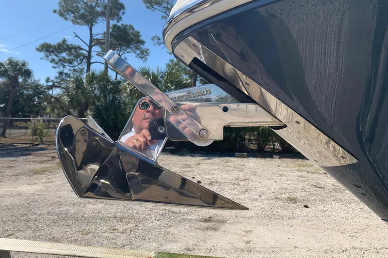 Slide: The Image of 2019 Chris-Craft Catalina 27 anchor detail with reflection, outdoors. - 7