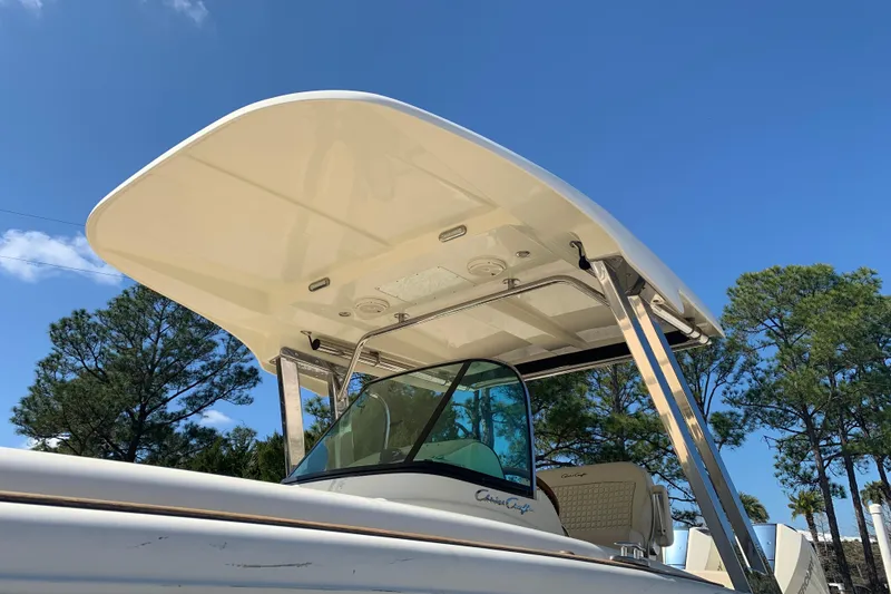 Slide: The Image of 2019 Chris-Craft Catalina 27 boat with T-top against clear blue sky. - 8