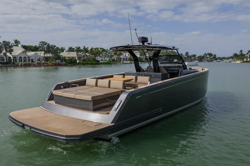 Slide: The Image of 2024 Pardo Yachts P43 luxury yacht on serene water, showcasing sleek design and spacious deck. - 10