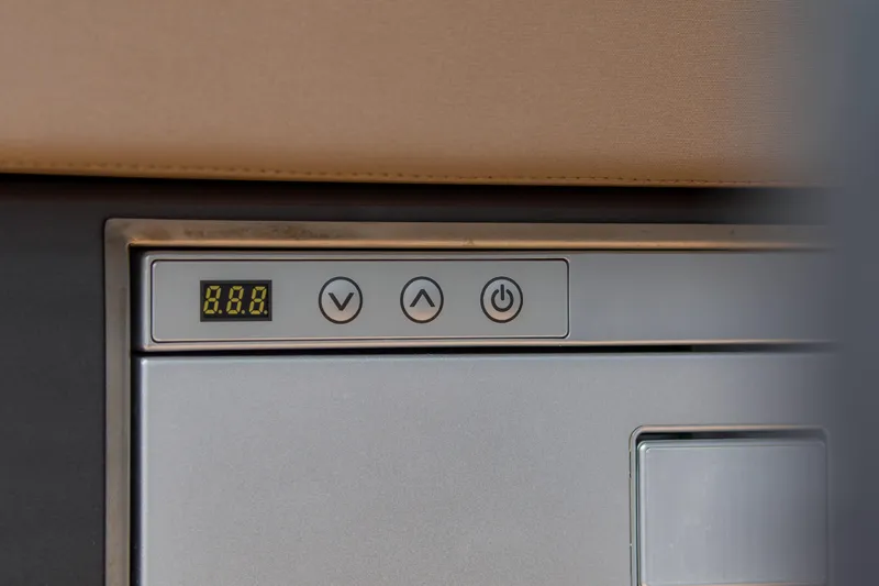 Slide: The Image of Control panel on 2024 Pardo Yachts P43, featuring digital display and buttons. - 19
