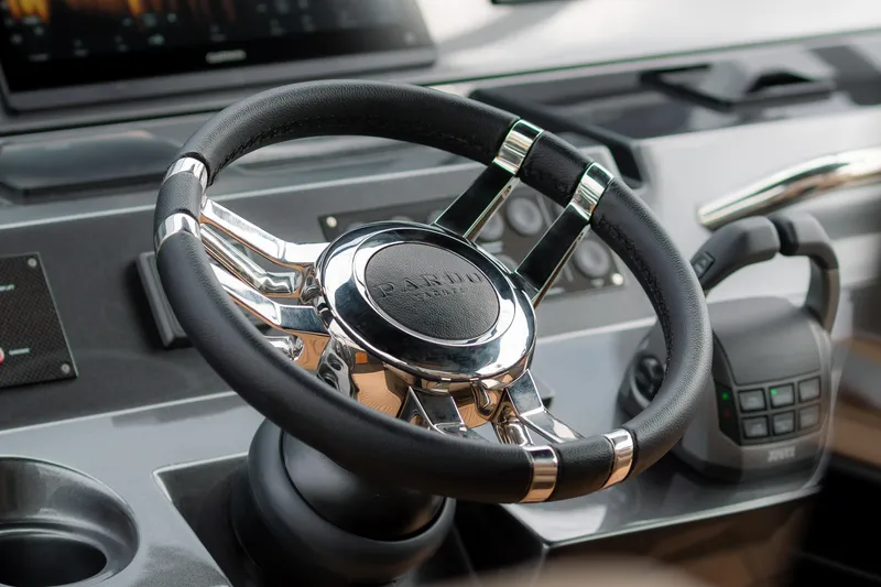 Slide: The Image of Steering wheel of 2024 Pardo Yachts P43, showcasing luxury yacht controls. - 24