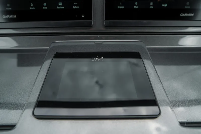 Slide: The Image of 2024 Pardo Yachts P43 dashboard with Garmin and mo2 quick gyro display. - 29