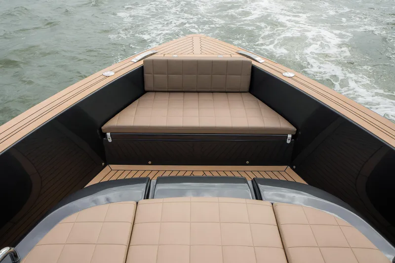 Slide: The Image of 2024 Pardo Yachts P43 luxury yacht with elegant tan seating and sleek design. - 36