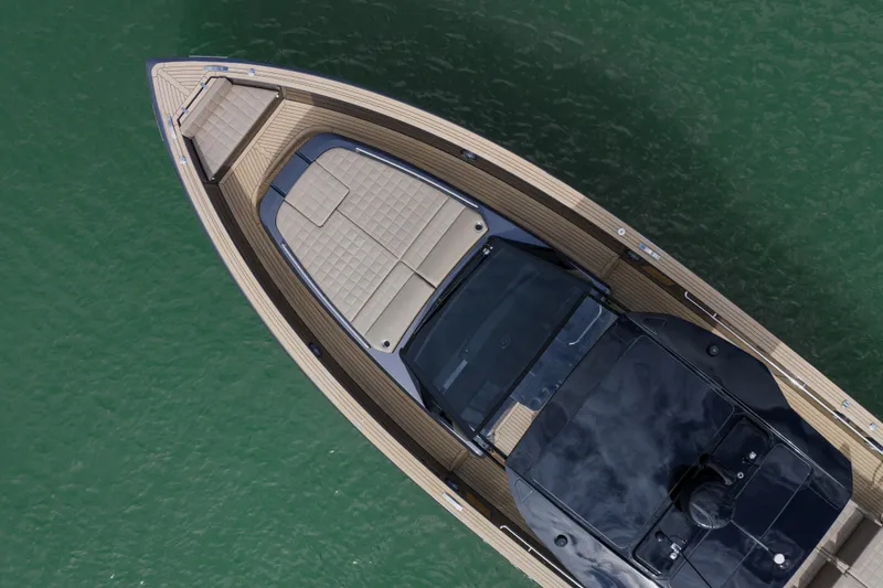 Slide: The Image of Top view of 2024 Pardo Yachts P43 luxury yacht on green water. - 37