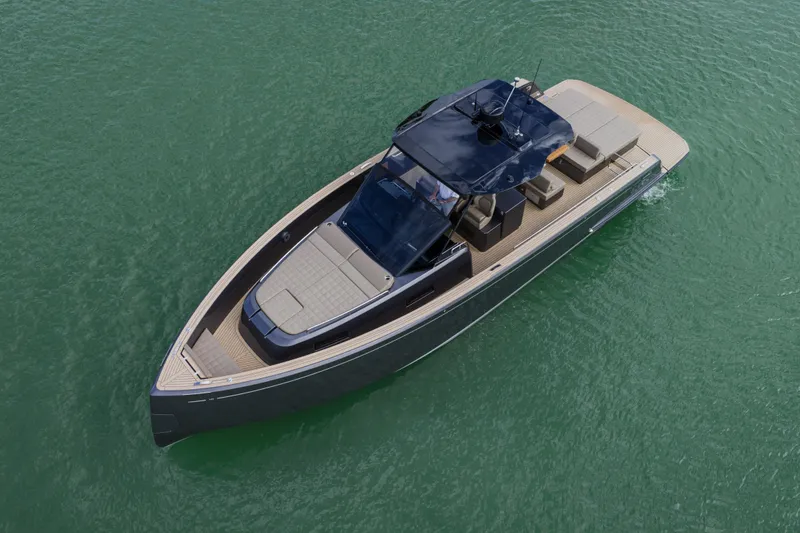Slide: The Image of 2024 Pardo Yachts P43 luxury yacht cruising on clear green water. - 5