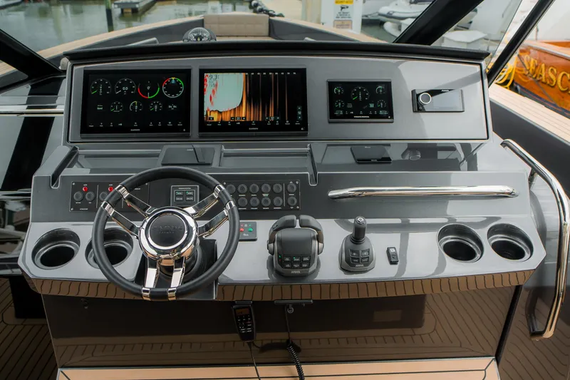 Slide: The Image of 2024 Pardo Yachts P43 helm with advanced navigation displays and controls. - 23