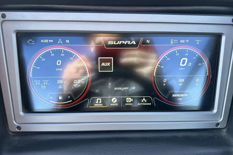 Slide: The Image of Dashboard display of a 2019 Supra SR showing speed, RPM, and auxiliary controls. - 15