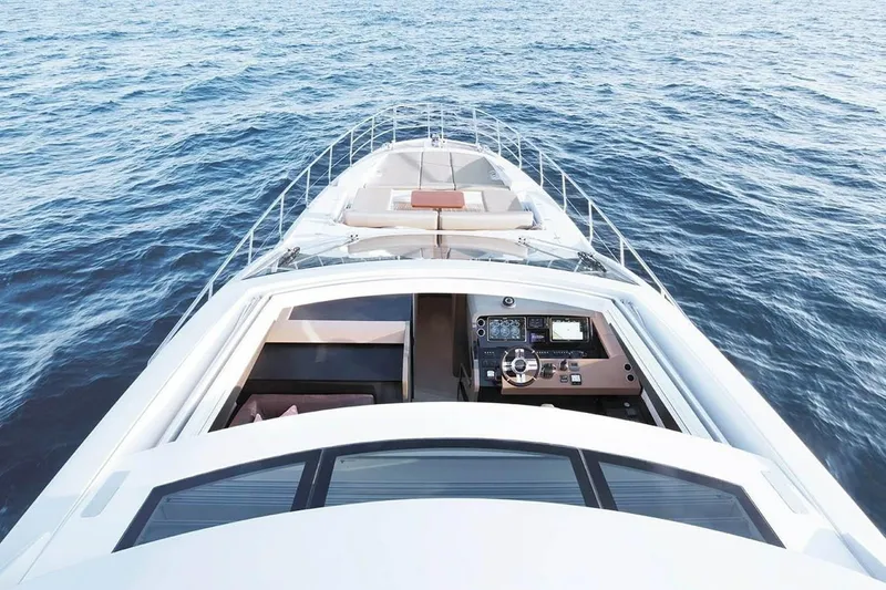 Slide: The Image of 2019 Azimut 77S yacht on open water, view from helm station. - 31