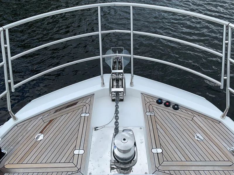 Slide: The Image of Bow of 2019 Azimut 77S yacht with anchor chain and teak decking. - 11