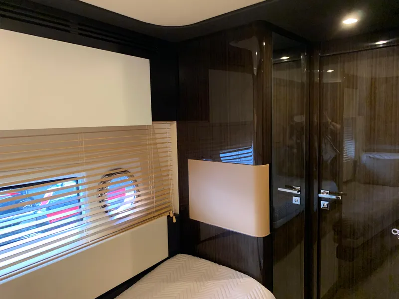 Slide: The Image of Luxurious interior cabin of 2019 Azimut 77S yacht with modern design and porthole window. - 24