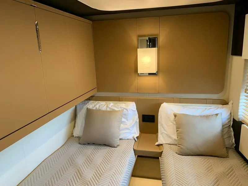 Slide: The Image of Twin bed cabin interior of 2019 Azimut 77S yacht with beige decor. - 28