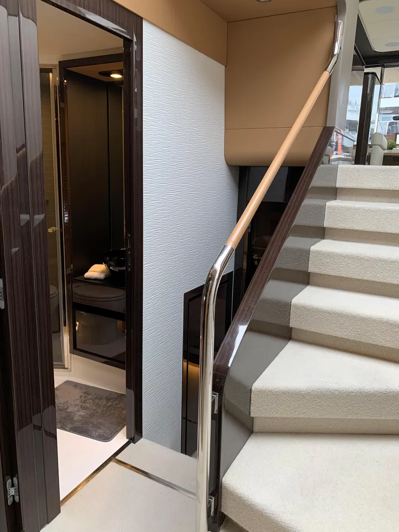 Slide: The Image of Interior staircase of 2019 Azimut 77S yacht with modern design. - 14