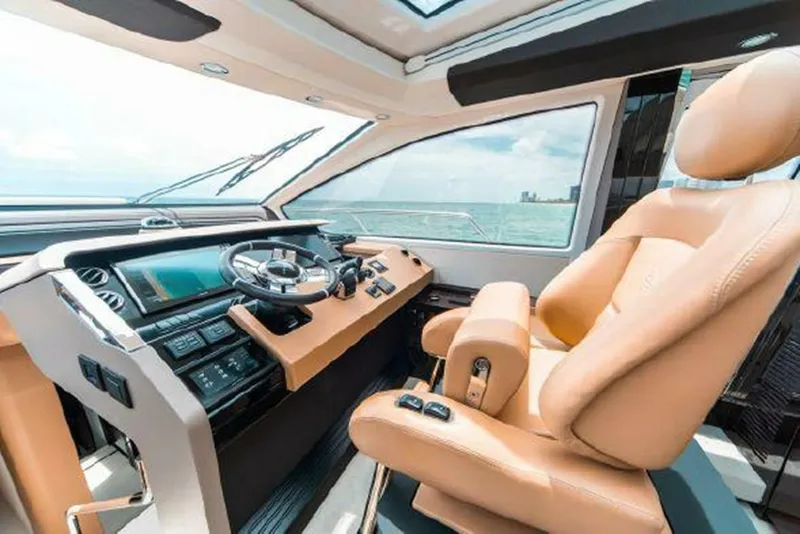 Slide: The Image of Luxurious helm station of 2019 Azimut 77S yacht with leather captain's chair. - 7