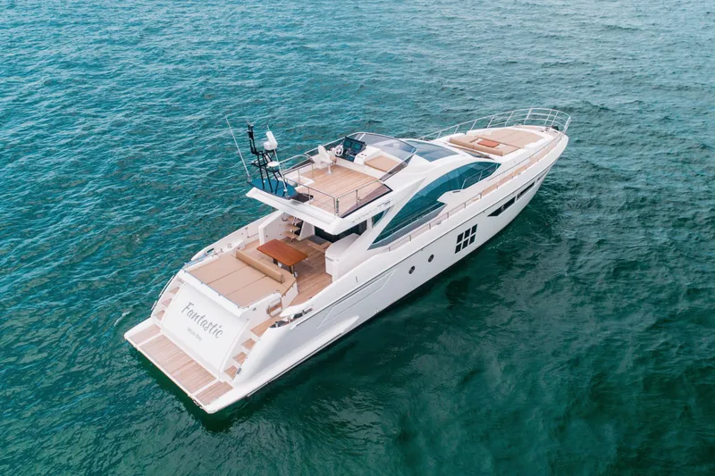 Slide: The Image of 2019 Azimut 77S yacht cruising on open water, showcasing sleek design and luxury features. - 42