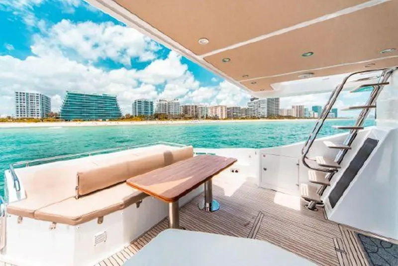 Slide: The Image of 2019 Azimut 77S yacht deck with ocean and city skyline view. - 1