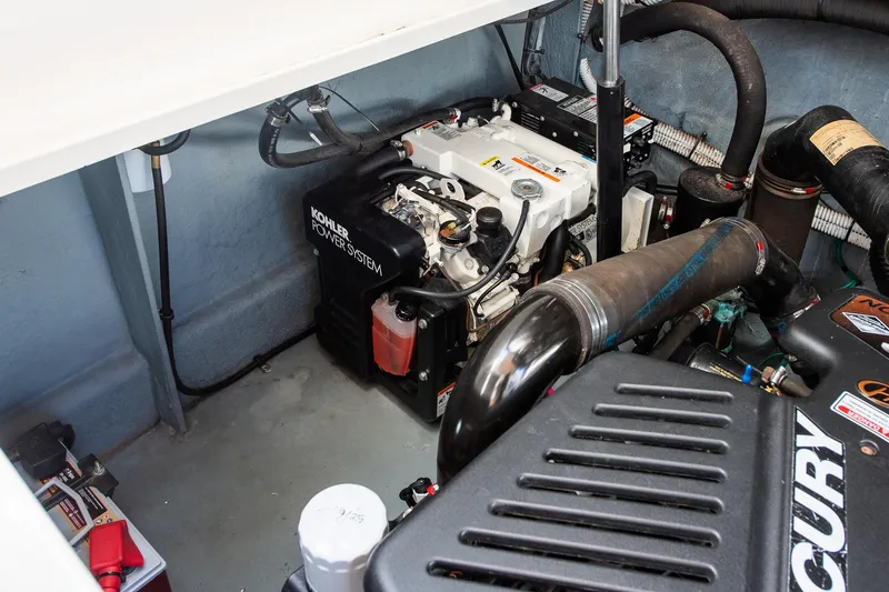 Slide: The Image of Engine compartment of 2003 Sea Ray 340 Sundancer with Kohler power system. - 39