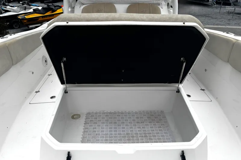 Slide: The Image of 2021 Sea Fox 328 Commander boat with Garmin radar, docked among other boats. - 17