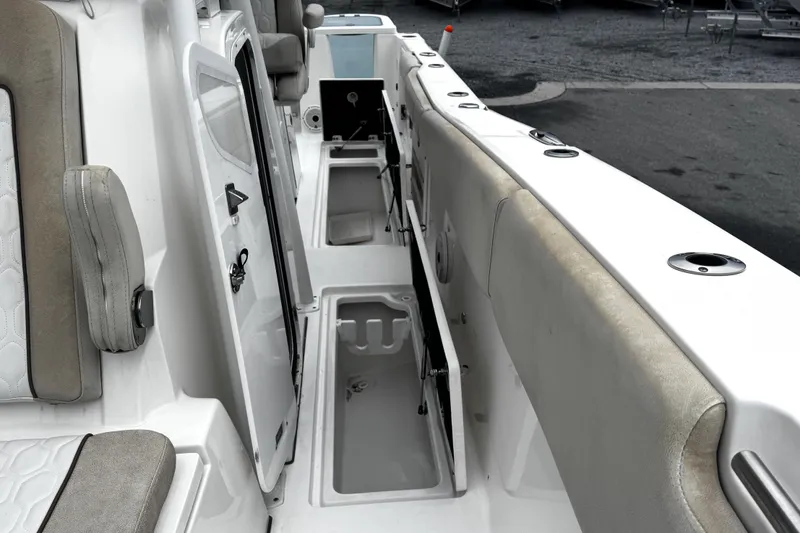 Slide: The Image of 2021 Sea Fox 328 Commander boat with Garmin equipment in a marina setting. - 19