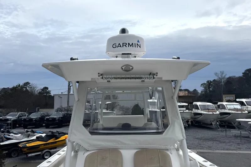 Slide: The Image of 2021 Sea Fox 328 Commander boat interior with storage compartments and seating. - 20