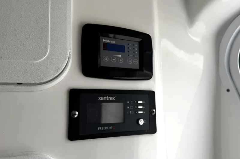 Slide: The Image of 2021 Sea Fox 328 Commander boat interior with Yeti cooler storage compartment. - 28