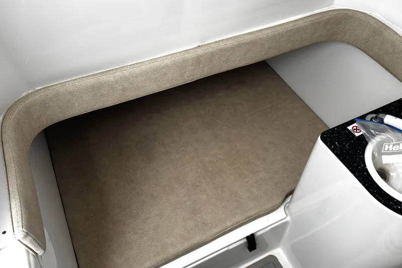 Slide: The Image of 2021 Sea Fox 328 Commander boat storage compartment with open door and tackle boxes. - 30