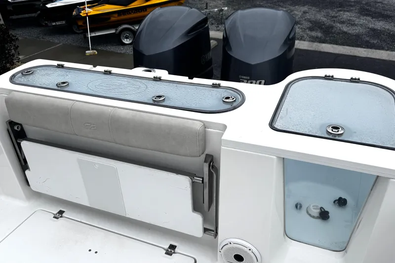 Slide: The Image of 2021 Sea Fox 328 Commander with dual Yamaha 300 engines, showcasing the boat's powerful setup. - 39