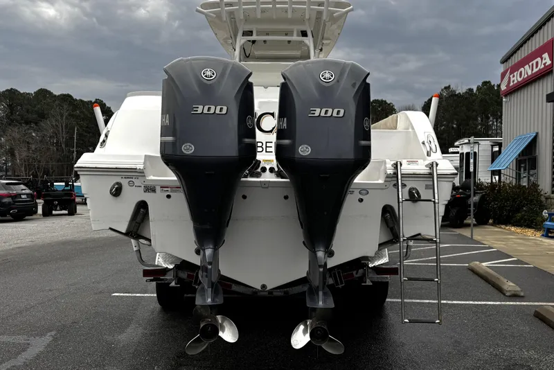 Slide: The Image of 2021 Sea Fox 328 Commander with dual Yamaha 300 engines on a trailer. - 4