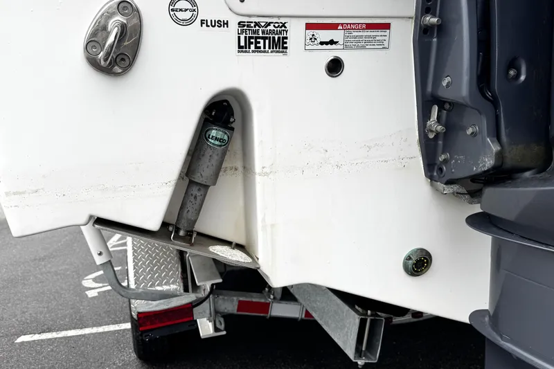 Slide: The Image of Open hatch of 2021 Sea Fox 328 Commander showing internal wiring and components. - 42