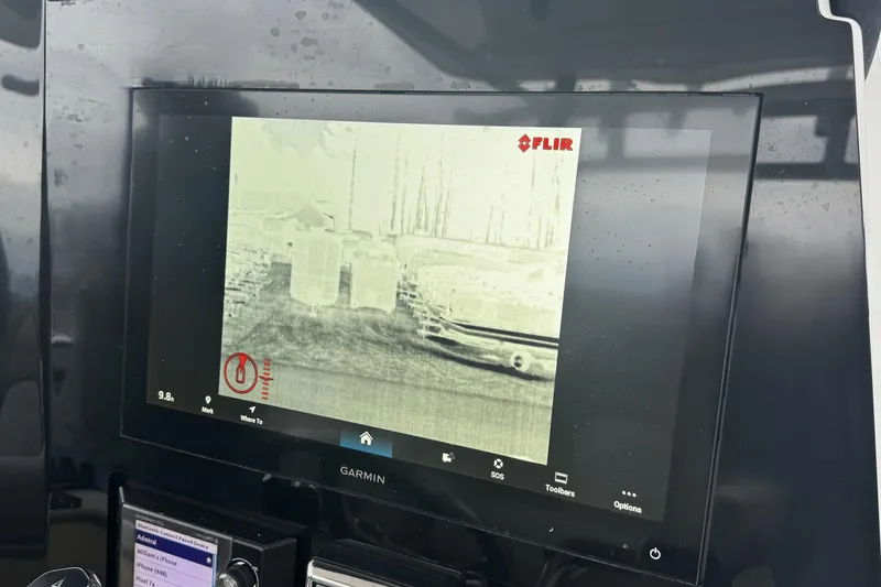 Slide: The Image of 2021 Sea Fox 328 Commander dashboard with navigation and control systems. - 9