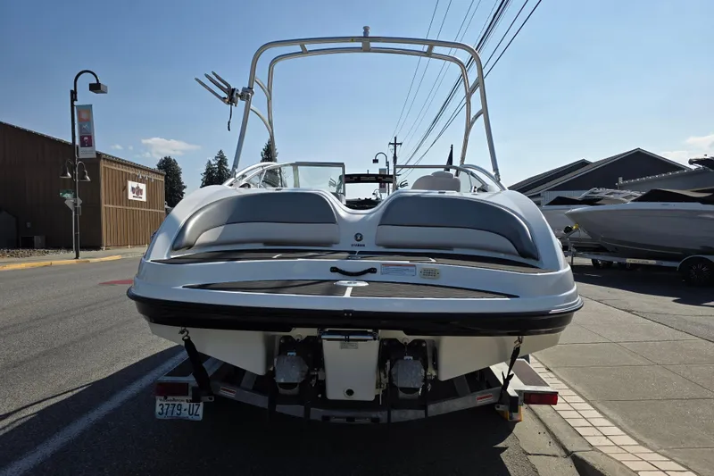 Slide: The Image of 2009 Yamaha Boats AR210 on trailer, rear view, parked on street. - 6