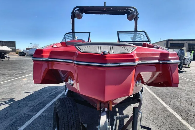 Slide: The Image of Red 2023 Heyday WT-2DC boat on trailer in parking lot, sunny day. - 18