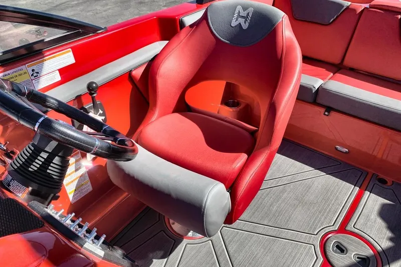 Slide: The Image of Red and gray interior of 2023 Heyday WT-2DC boat with steering wheel and seating. - 23