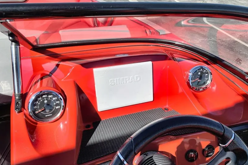 Slide: The Image of 2023 Heyday WT-2DC boat dashboard with Simrad display and gauges. - 25