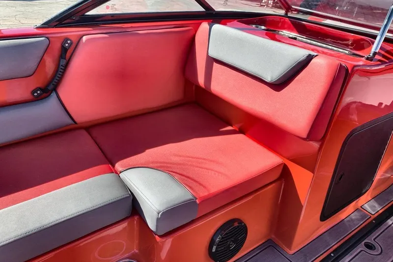 Slide: The Image of 2023 Heyday WT-2DC boat interior with red and gray seating. - 27