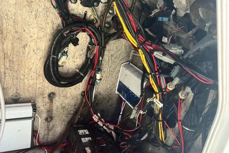 Slide: The Image of Wiring and components inside a 2010 Key West 246 Bay Reef boat. - 17