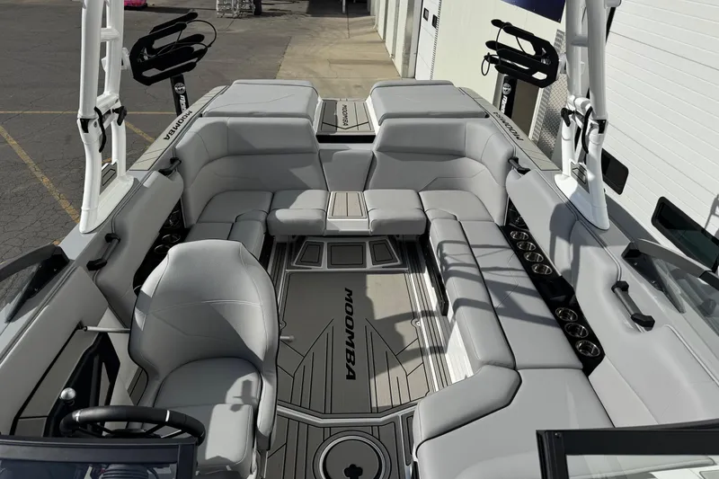 Slide: The Image of 2026 Moomba Max boat interior with spacious seating and modern design. - 5