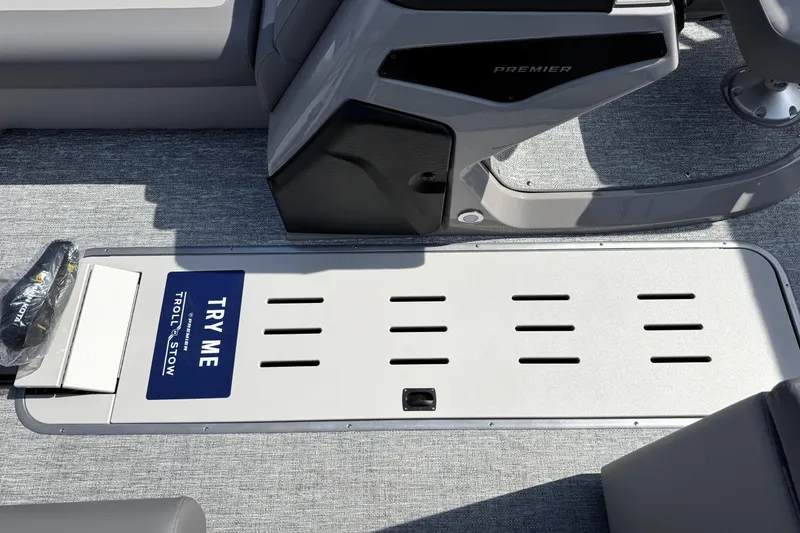 Slide: The Image of 2026 Premier 230 Sunsation Angler 2pt boat interior with "Try Me" Troll & Stow feature. - 13