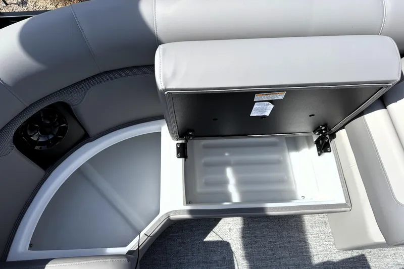 Slide: The Image of Open storage compartment in 2026 Premier 230 Sunsation Angler 2pt boat seat. - 27