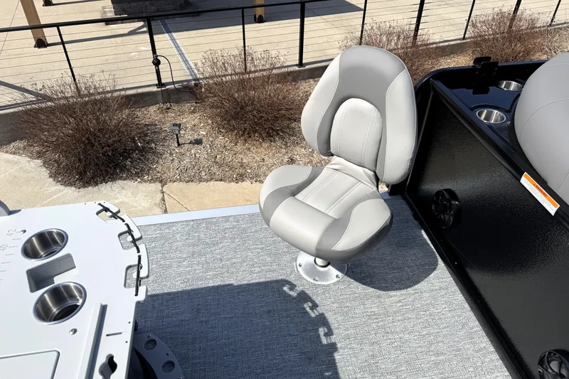 Slide: The Image of Premier 230 Sunsation Angler 2pt 2026 boat seat with cup holders on deck. - 31