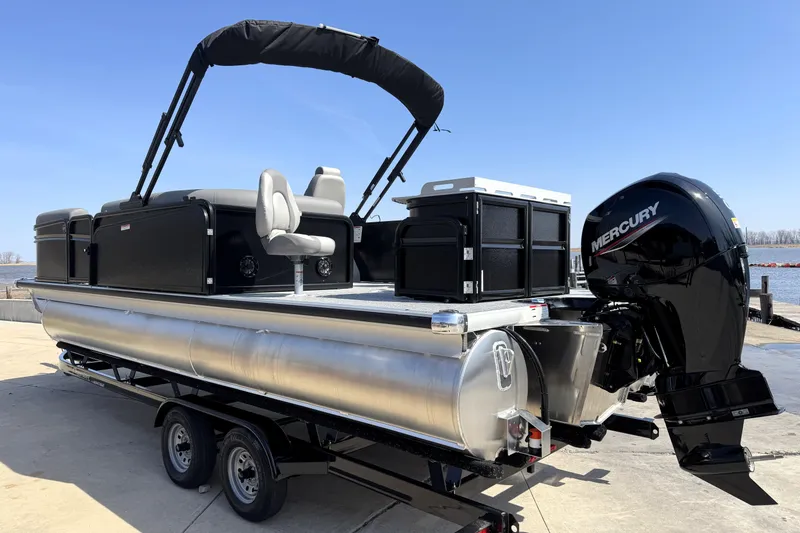 Slide: The Image of 2026 Premier 230 Sunsation Angler 2pt pontoon boat with Mercury engine on trailer. - 4