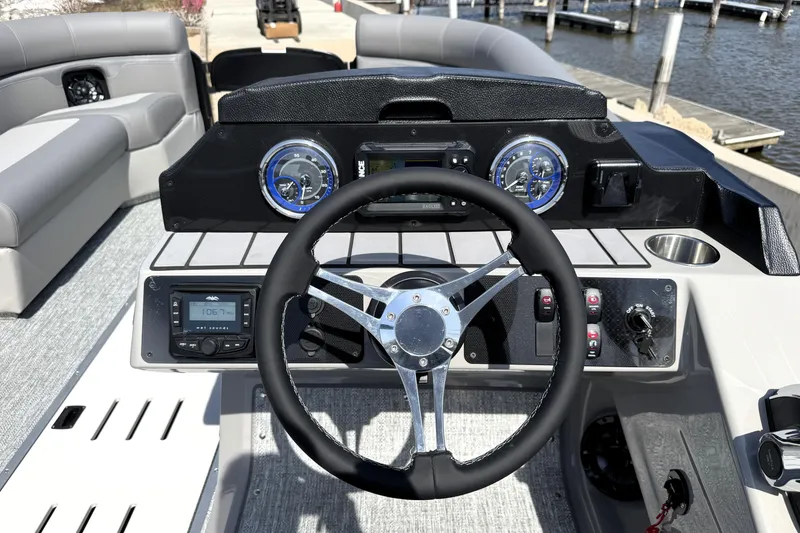Slide: The Image of Steering console of 2026 Premier 230 Sunsation Angler 2pt boat with modern controls. - 42