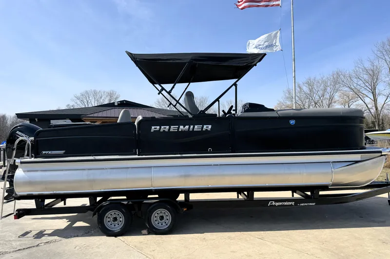 Slide: The Image of 2026 Premier 230 Sunsation Angler 2pt pontoon boat on trailer, outdoor setting. - 43