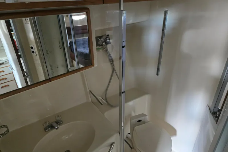 Slide: The Image of VHF radio system on 1994 Sea Ray 370 Sedan Bridge boat dashboard. - 15